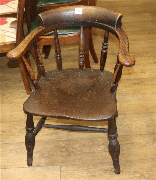 A 19th century smokers bow armchair and another similar chair